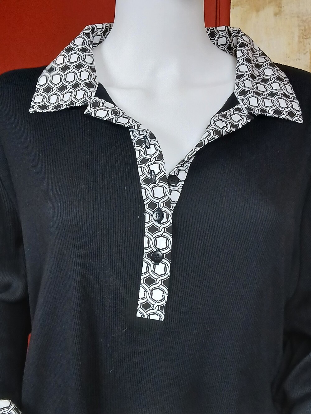 Black Women's Knit Polo Top with Patterned Collar